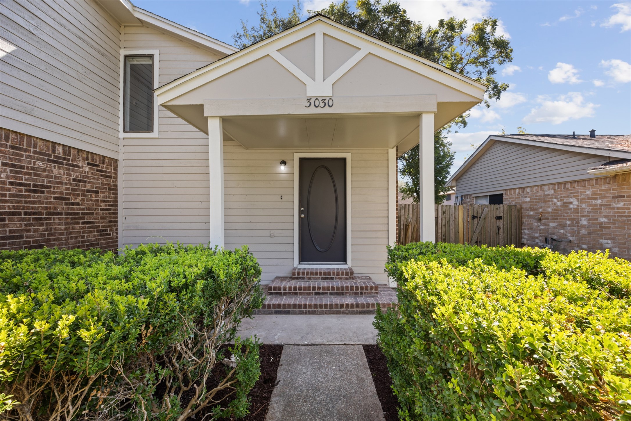 3030 Becket Street Pearland, TX 77584 - Photo 6 of 22 a front view of a house with garden