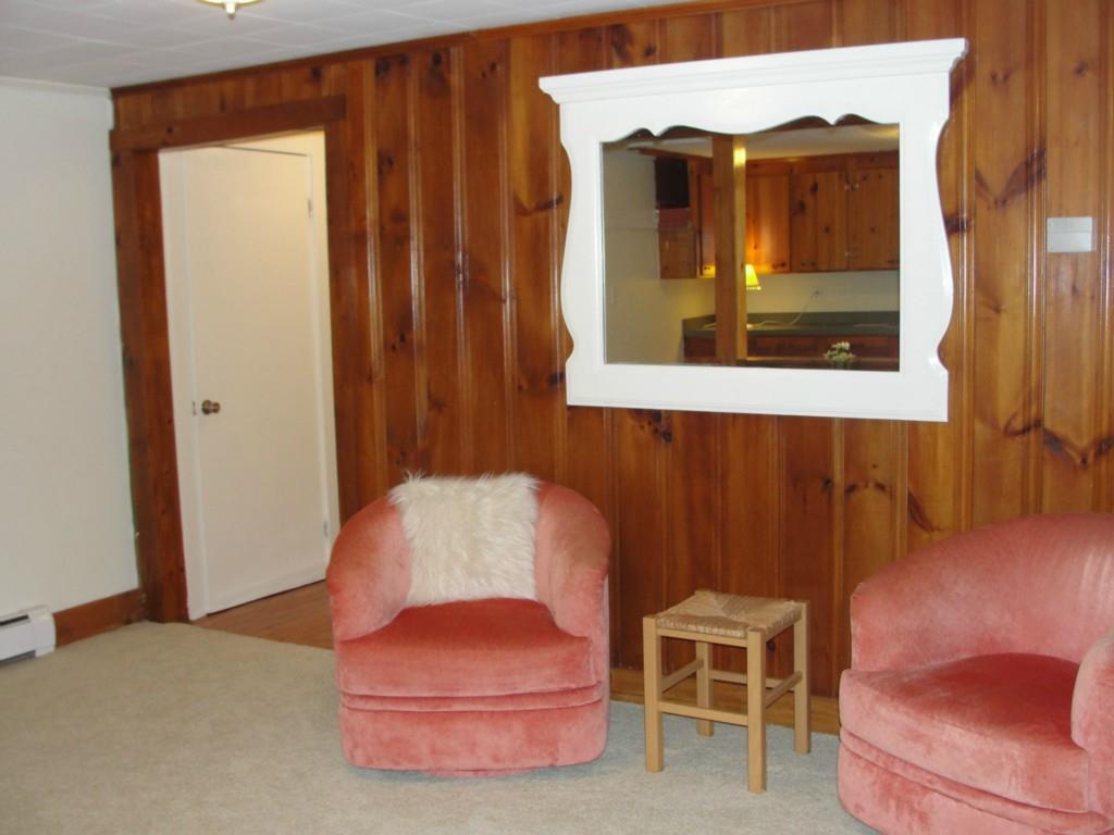 146 Brickyard Hill Road Bridgton, ME 04009 - Photo 15 of 28 LR has kitchen on one side and...