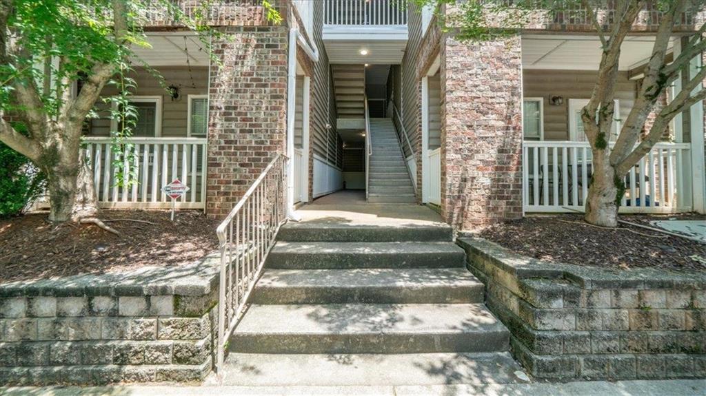 2700 Pine Tree Road Northeast, Unit 1210 Atlanta, GA 30324 - Photo 1 of 1 a front view of a house