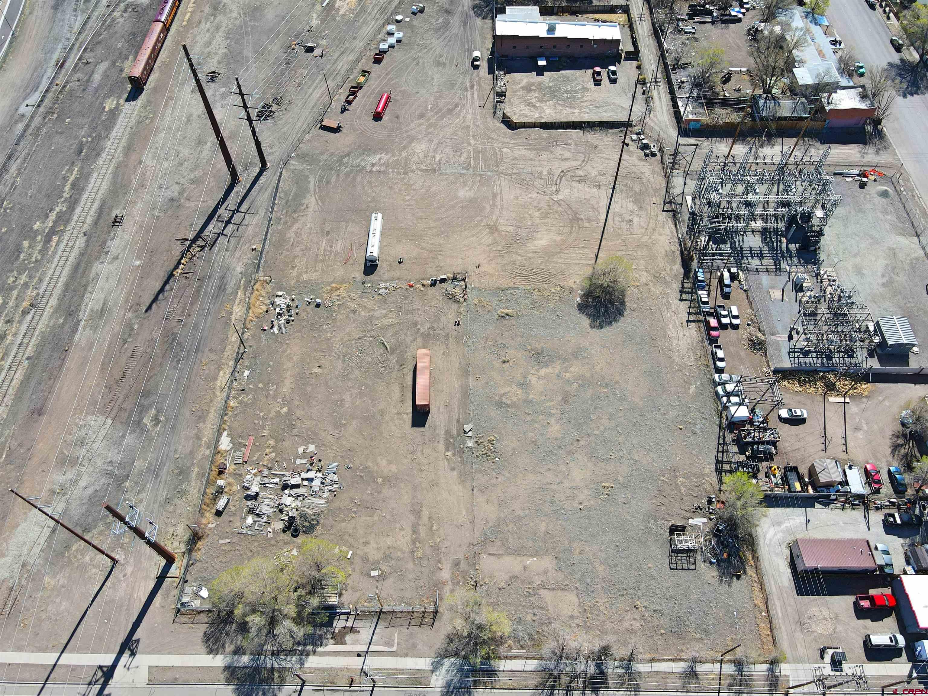 700 Ross Alamosa, CO 81101 - Photo 4 of 7 an aerial view of residential house with parking