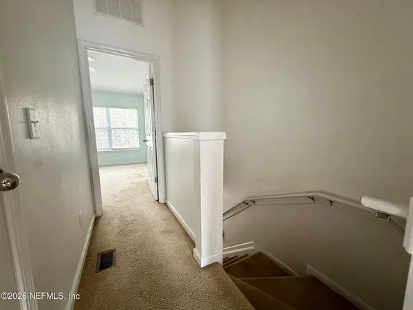 a view of a room with rack on the wall