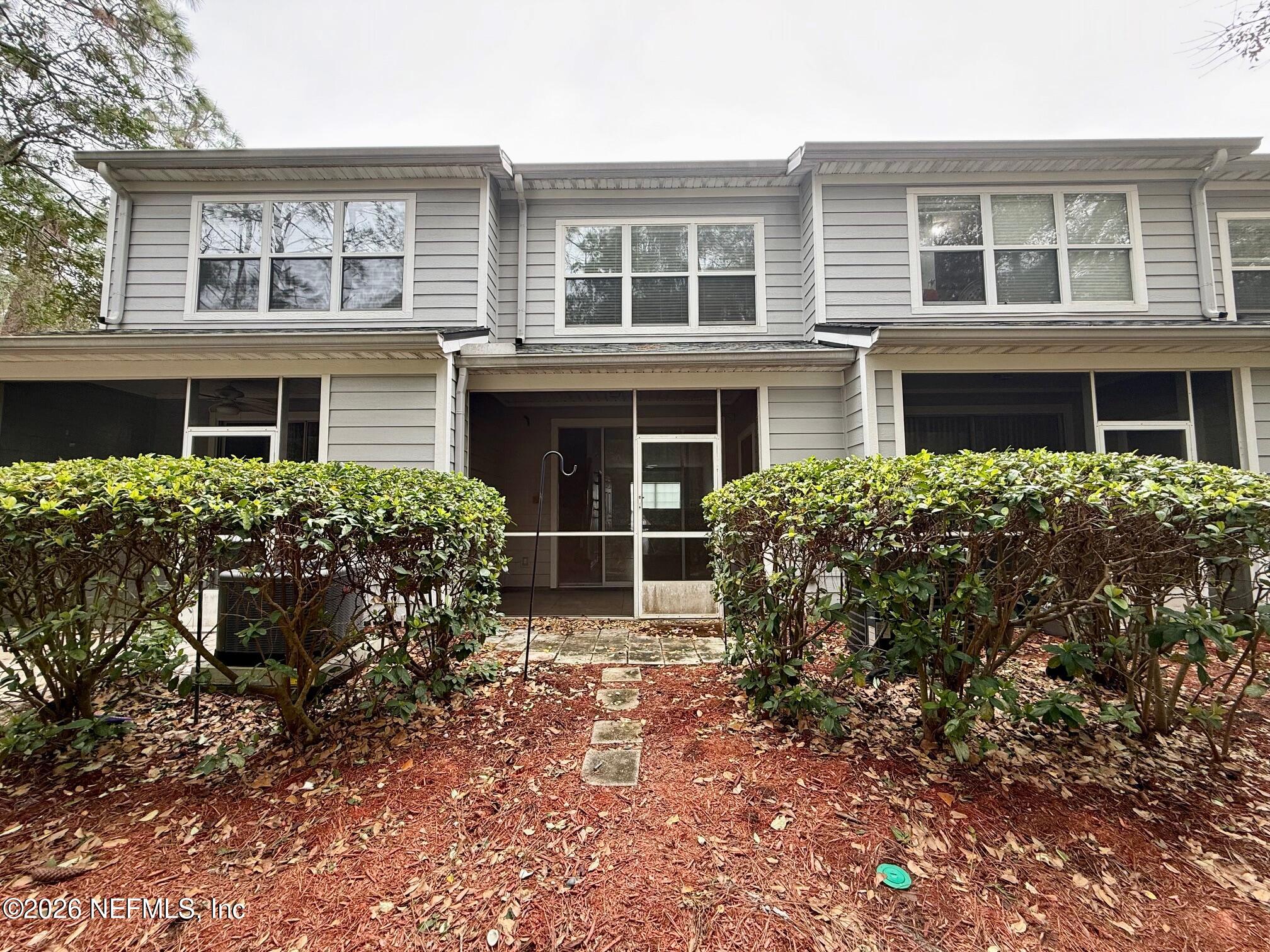 3585 Pebble Path Lane Jacksonville, FL 32224 - Photo 8 of 16 a house view with a garden space