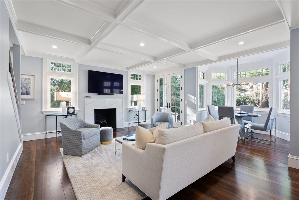 123 Abbott Road Wellesley, MA 02481 - Photo 11 of 42 a living room with furniture fireplace and a large window