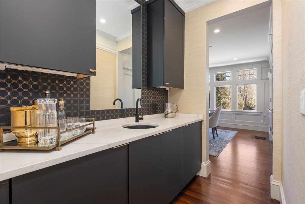 123 Abbott Road Wellesley, MA 02481 - Photo 13 of 42 a en suite bathroom with a double vanity sink and a mirror