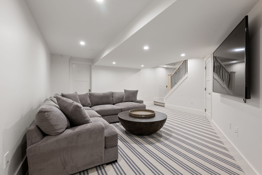 123 Abbott Road Wellesley, MA 02481 - Photo 34 of 42 a living room with furniture and a wooden floor