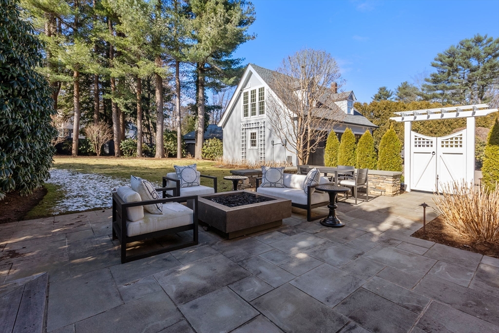 123 Abbott Road Wellesley, MA 02481 - Photo 40 of 42 a building outdoor space with patio furniture and potted plants
