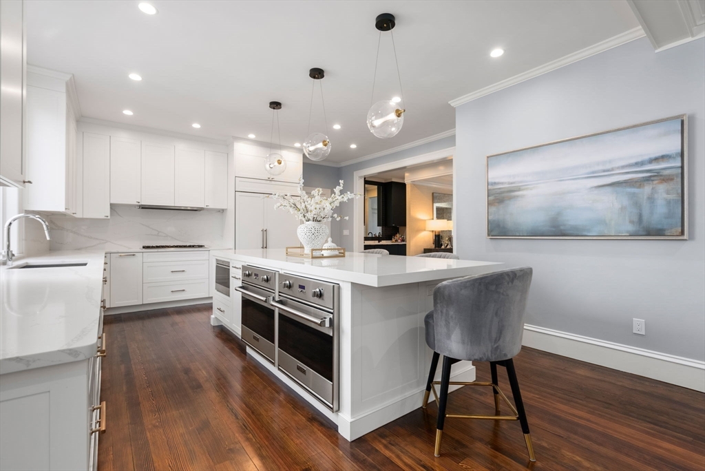123 Abbott Road Wellesley, MA 02481 - Photo 8 of 42 a kitchen with a stove a sink and a refrigerator