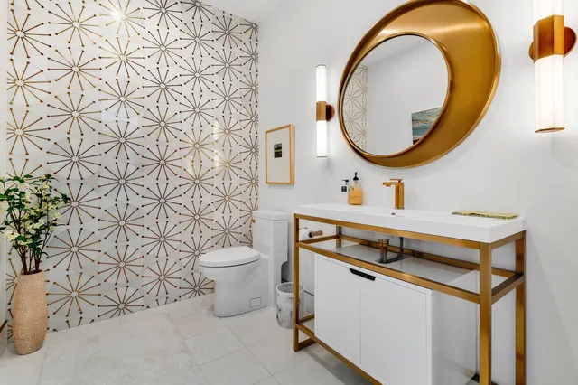 a bedroom with a bed and large window