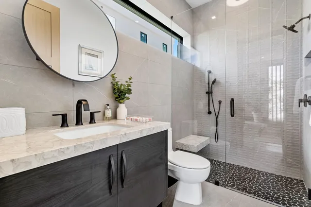 a swimming pool with outdoor seating and yard