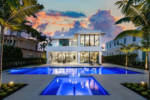 a view of swimming pool with a patio