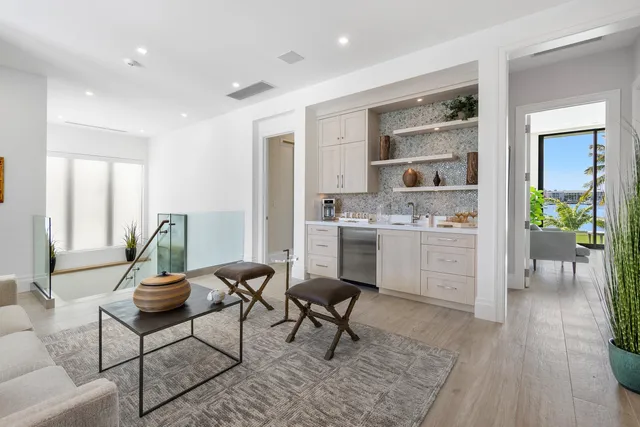 a utility room with sink dryer and washer