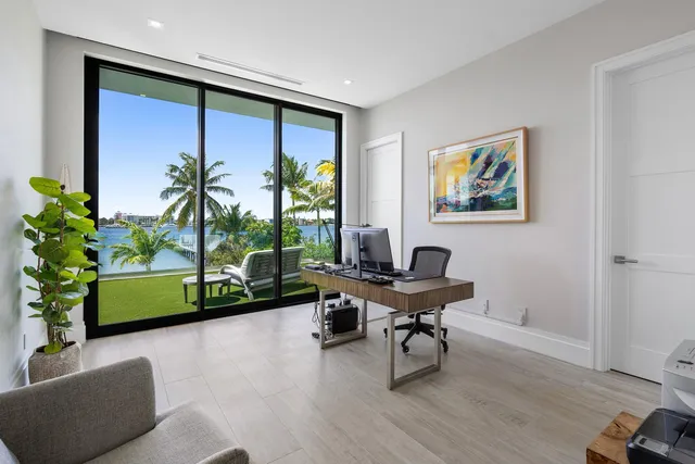 a view of swimming pool with chairs