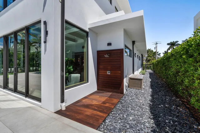a view of a swimming pool with outdoor seating