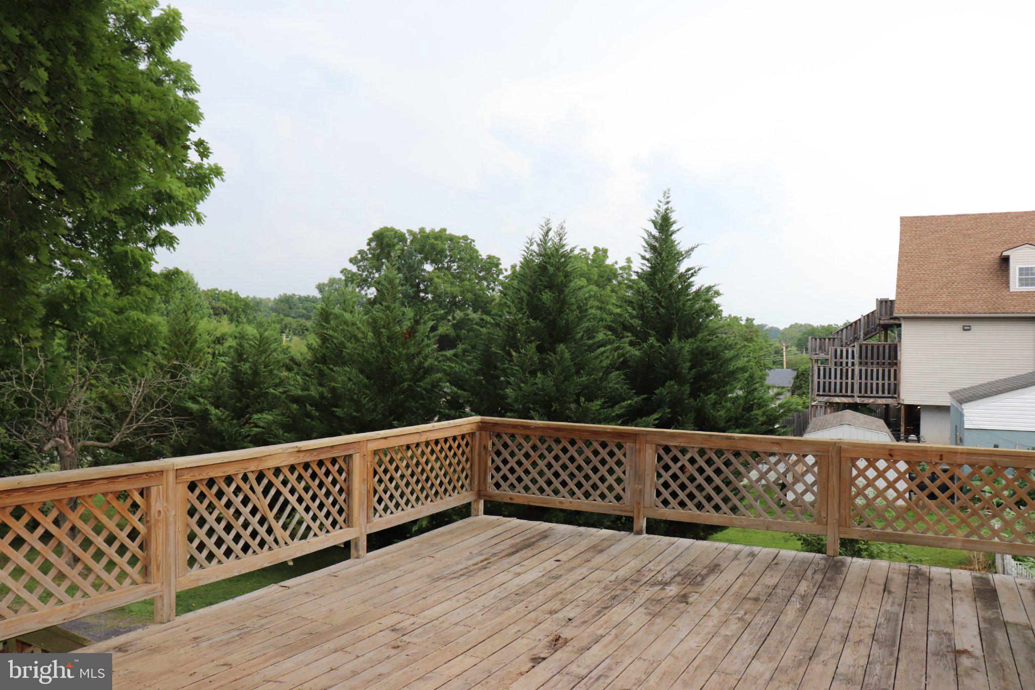 529 Main Street Delta, PA 17314 - Photo 5 of 24 Serene deck with lush green views.