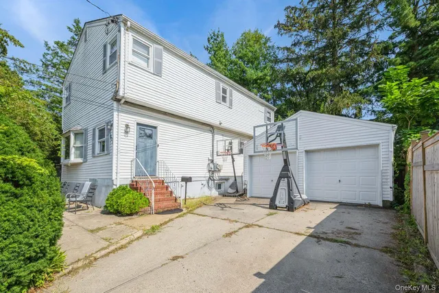 a house view with a backyard space