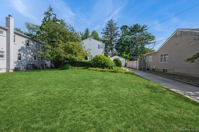 a view of a backyard with a garden