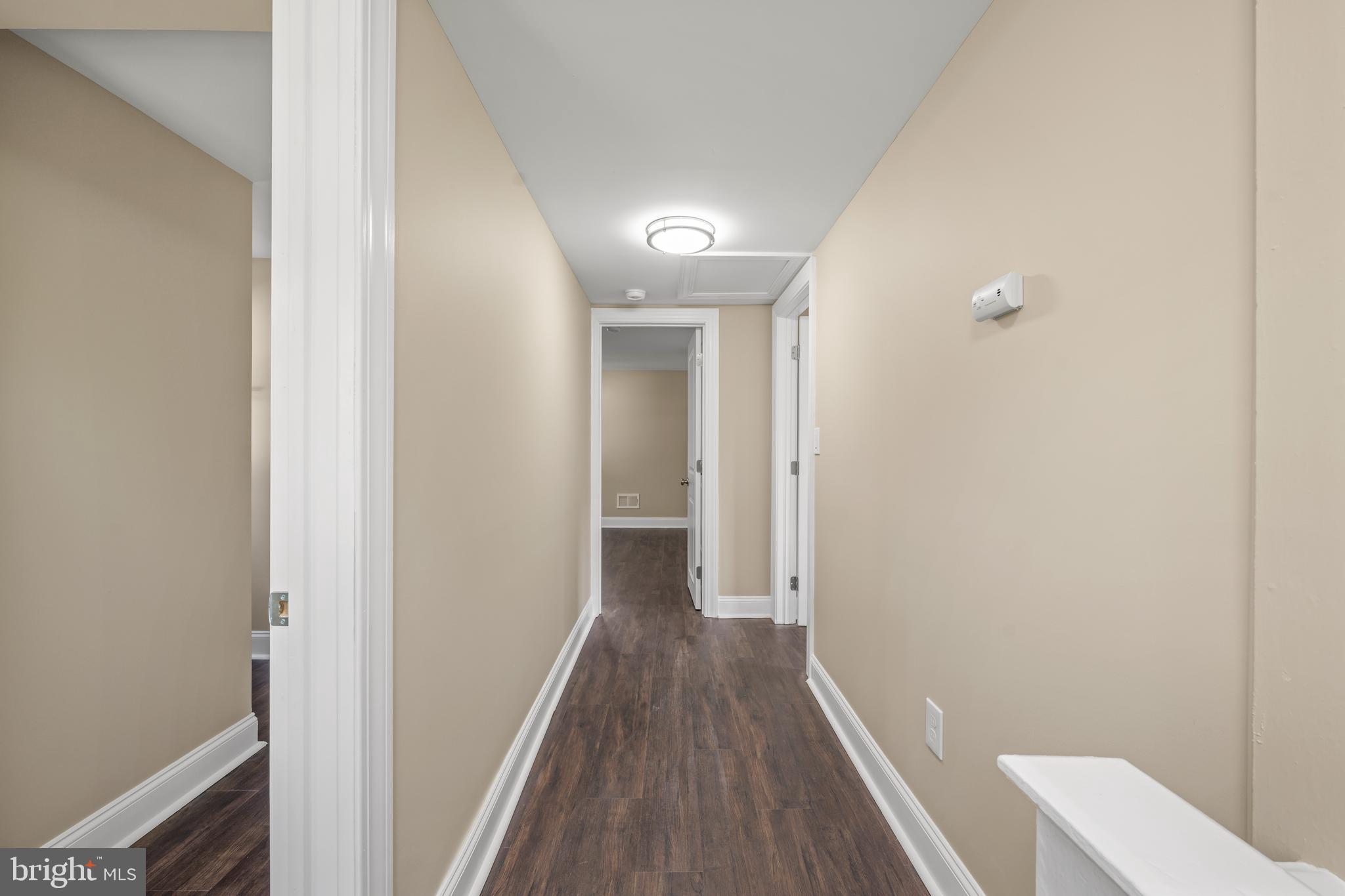 69 Hogbin Road Millville, NJ 08332 - Photo 9 of 18 a view of a hallway with wooden floor
