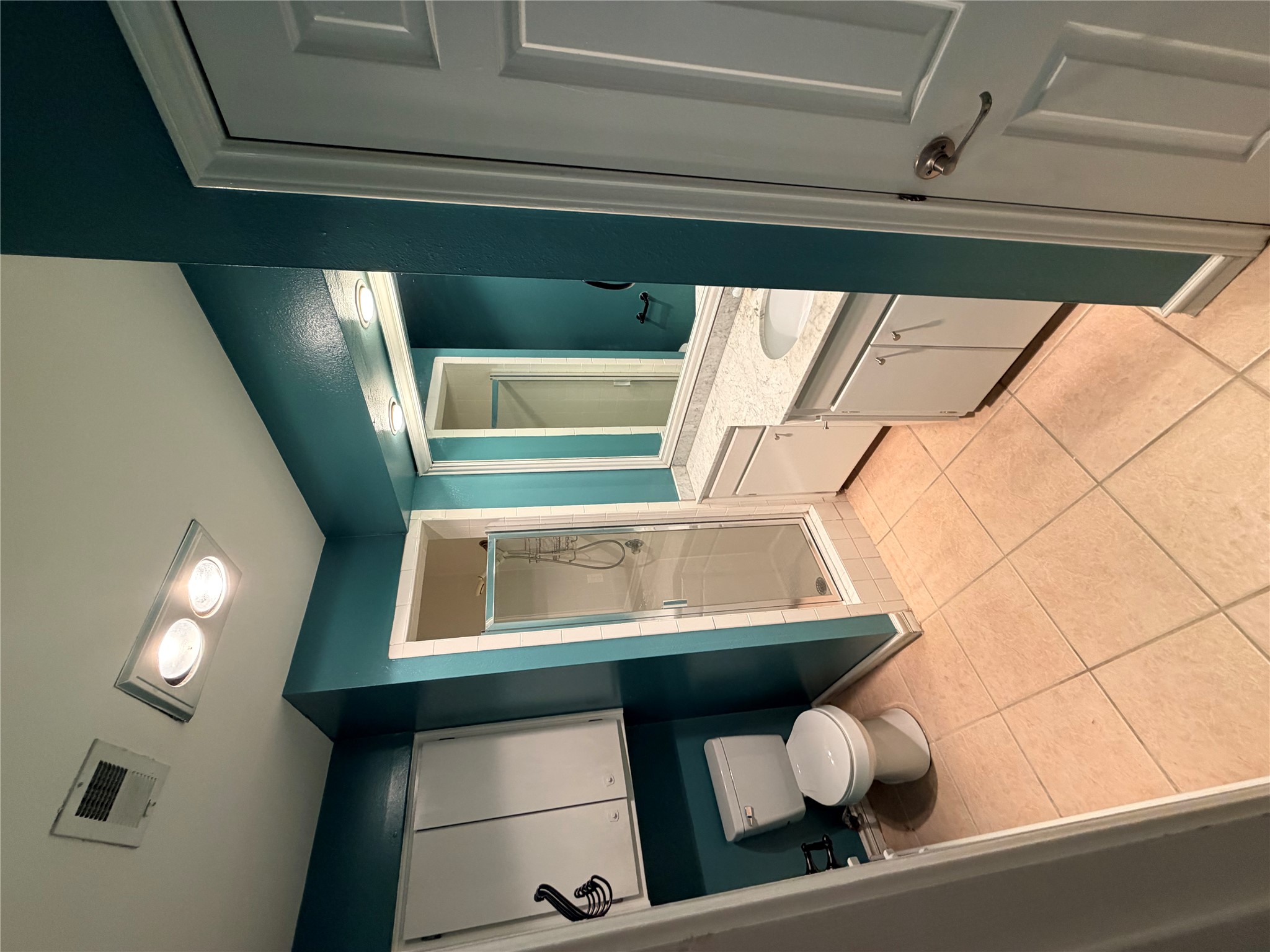 6600 Valleyside Road, Unit D20 Austin, TX 78731 - Photo 7 of 14 A well-appointed bathroom features a modern vanity and a functional stand-up shower.
