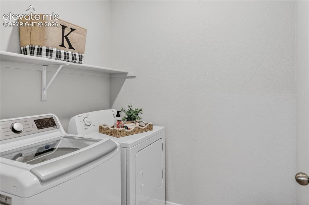 9734 Hidden Ranch Court Peyton, CO 80831 - Photo 12 of 29 Laundry room