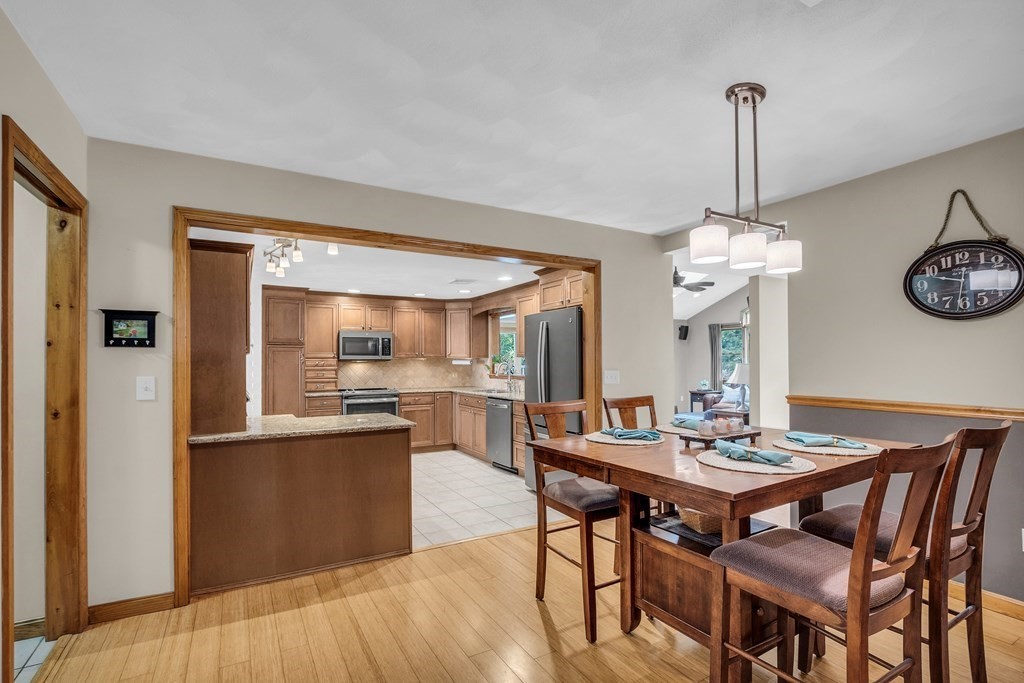 5 Colby Road Danvers, MA 01923 - Photo 12 of 33 a view of a dining room with furniture window and wooden floor