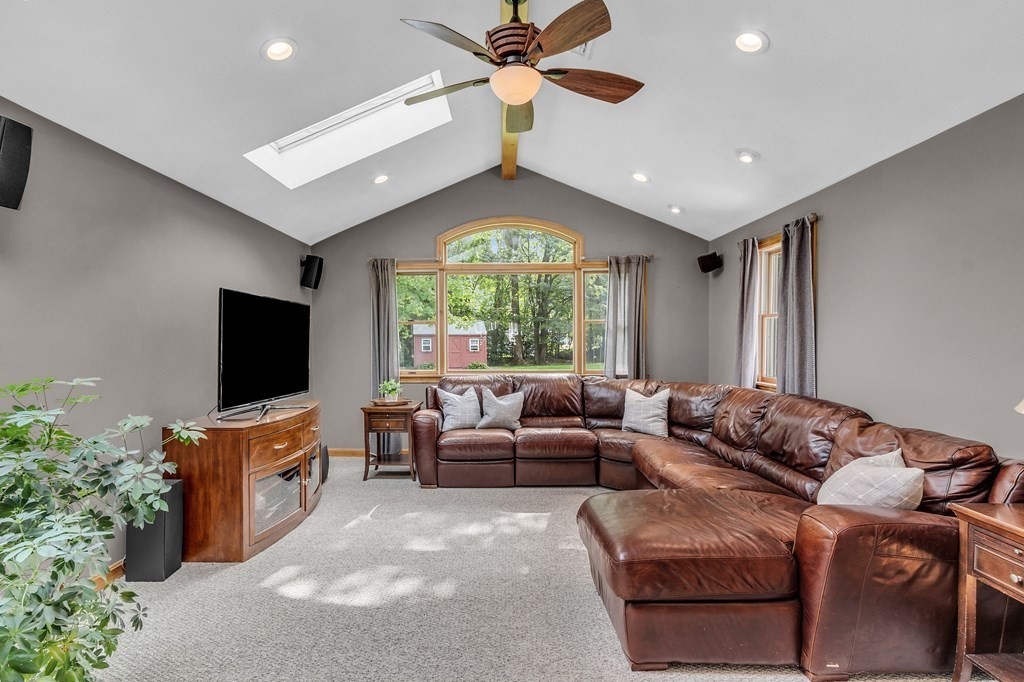5 Colby Road Danvers, MA 01923 - Photo 14 of 33 a living room with furniture and a flat screen tv