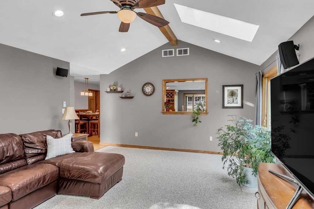 5 Colby Road Danvers, MA 01923 - Photo 15 of 33 a living room with furniture and a potted plant