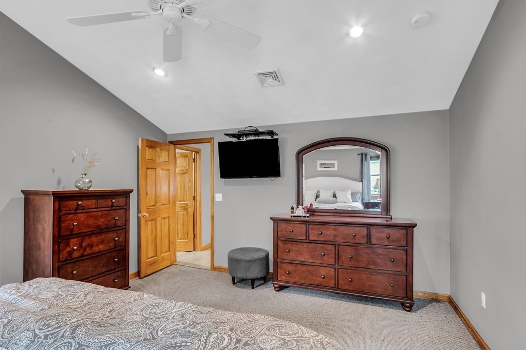 5 Colby Road Danvers, MA 01923 - Photo 17 of 33 a bedroom with a bed and a dresser