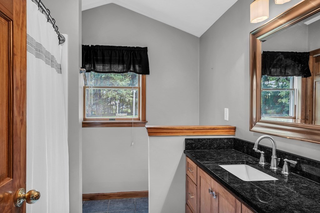 5 Colby Road Danvers, MA 01923 - Photo 18 of 33 a kitchen that has a sink and a stove in it