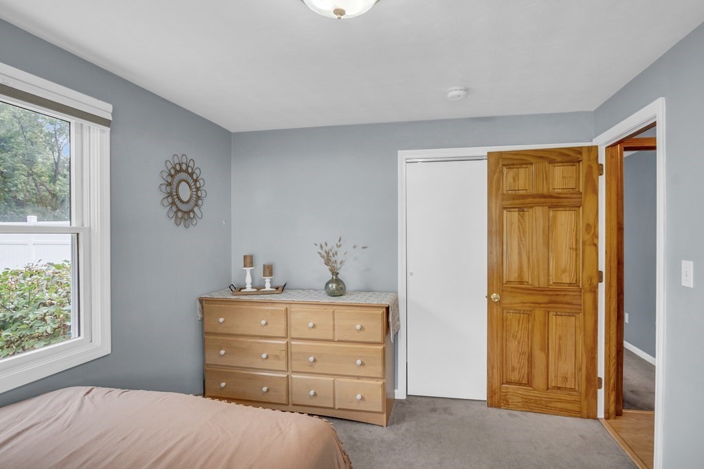 5 Colby Road Danvers, MA 01923 - Photo 20 of 33 a bedroom with a bed and a dresser