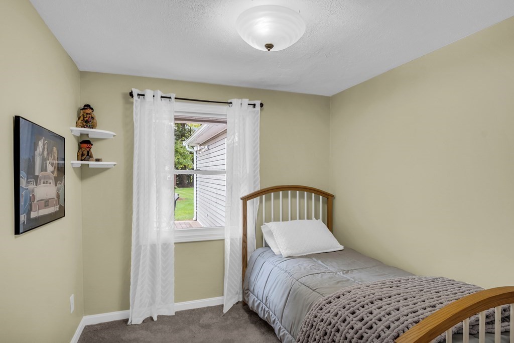 5 Colby Road Danvers, MA 01923 - Photo 21 of 33 a bedroom with a bed and a window
