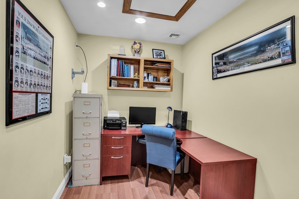 5 Colby Road Danvers, MA 01923 - Photo 23 of 33 a view of a workspace with furniture and a bookshelf