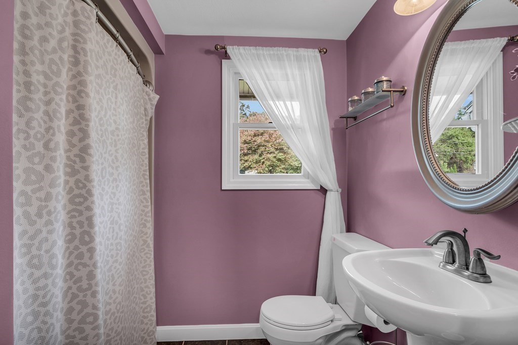 5 Colby Road Danvers, MA 01923 - Photo 24 of 33 a bathroom with a sink a toilet and a mirror