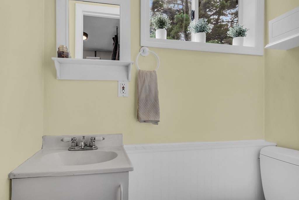 5 Colby Road Danvers, MA 01923 - Photo 25 of 33 a bathroom with a sink and mirror