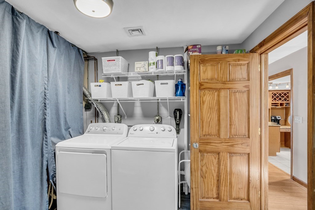 5 Colby Road Danvers, MA 01923 - Photo 26 of 33 a utility room with dryer and washer