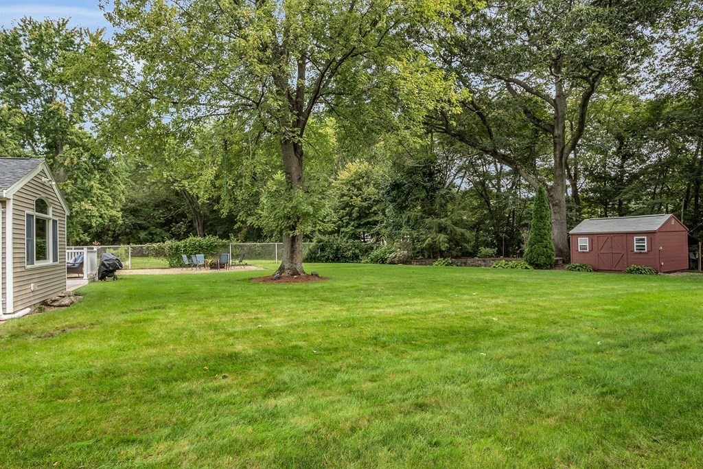 5 Colby Road Danvers, MA 01923 - Photo 29 of 33 a view of a house with a backyard