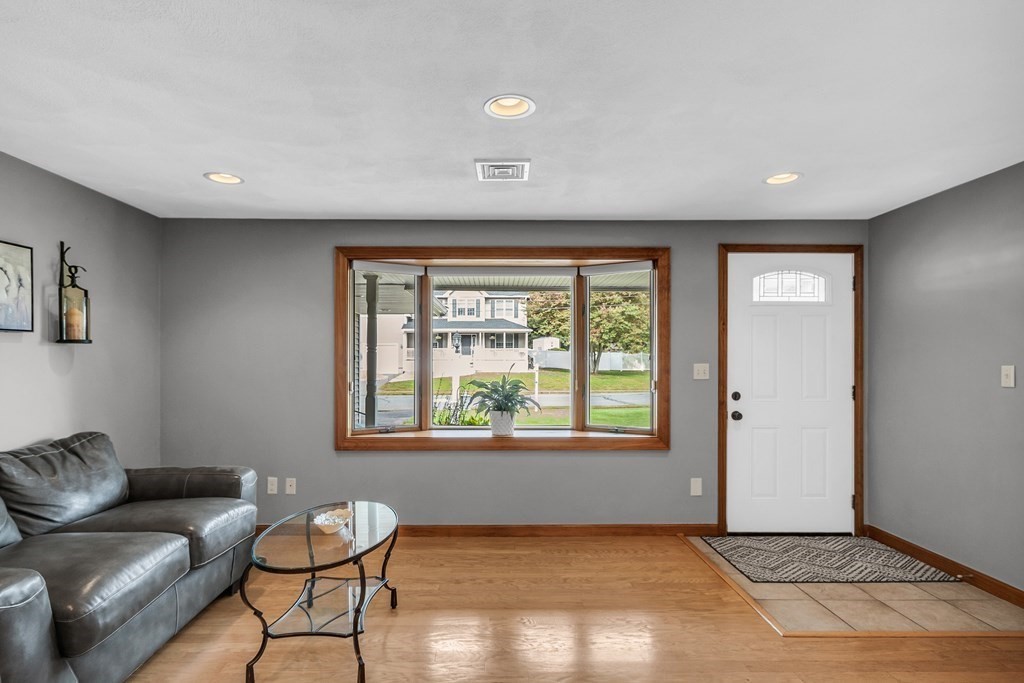 5 Colby Road Danvers, MA 01923 - Photo 6 of 33 a living room with furniture and a window