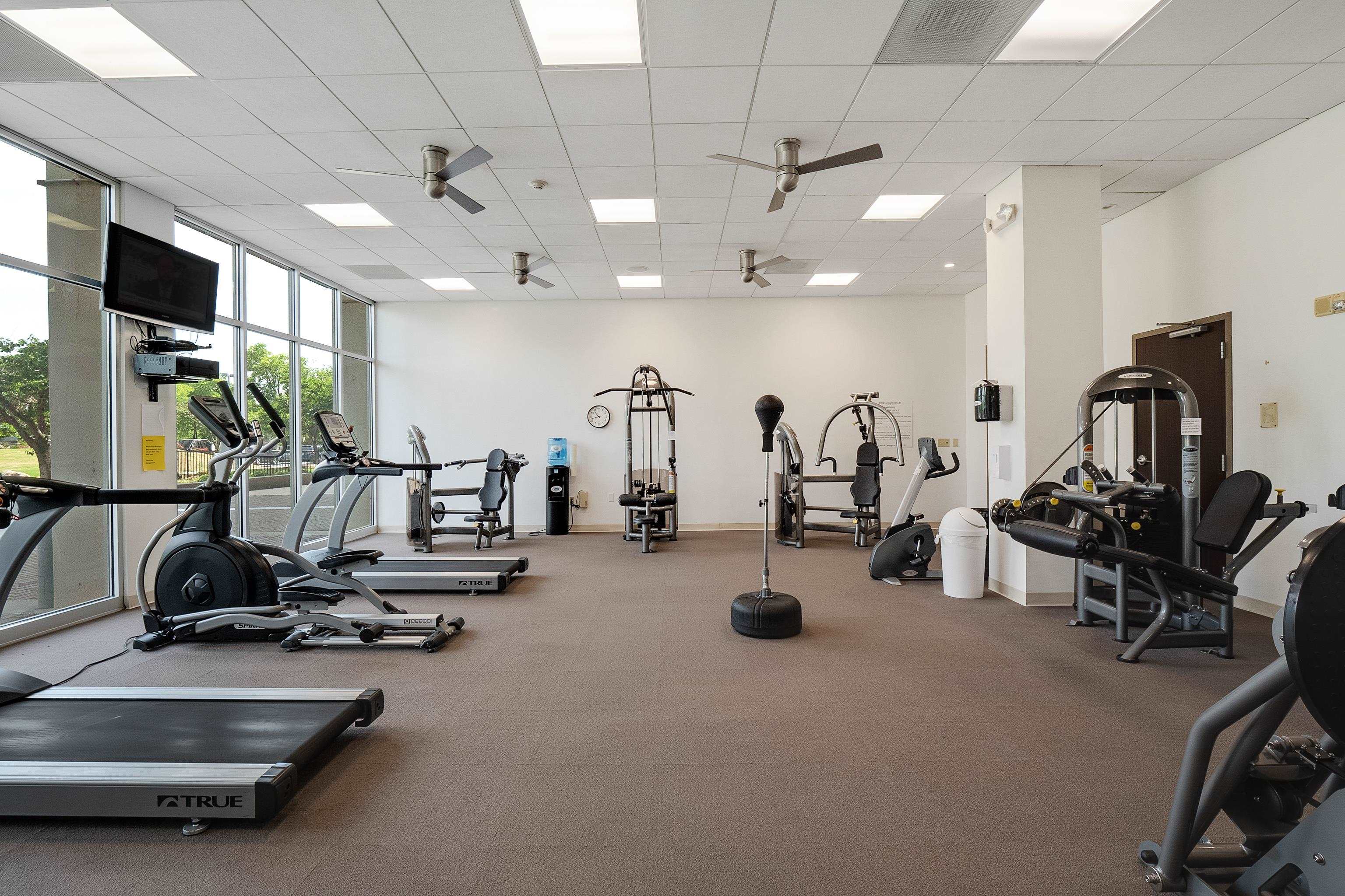 655 Riverside Drive, Unit 708A Memphis, TN 38103 - Photo 24 of 30 a view of a room with gym equipment