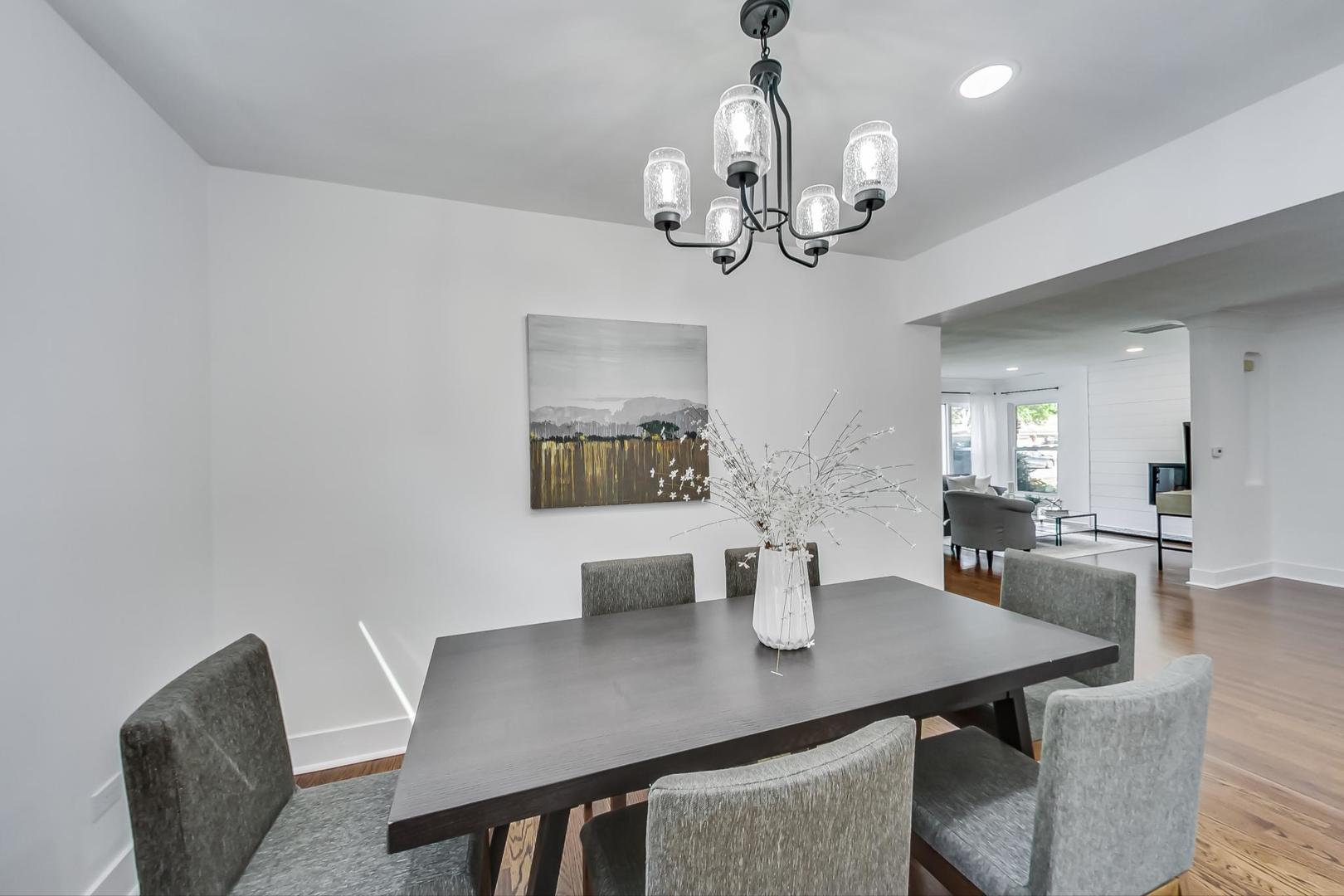 1211 West Talcott Road Park Ridge, IL 60068 - Photo 13 of 57 a view of a dining room with a table and chairs