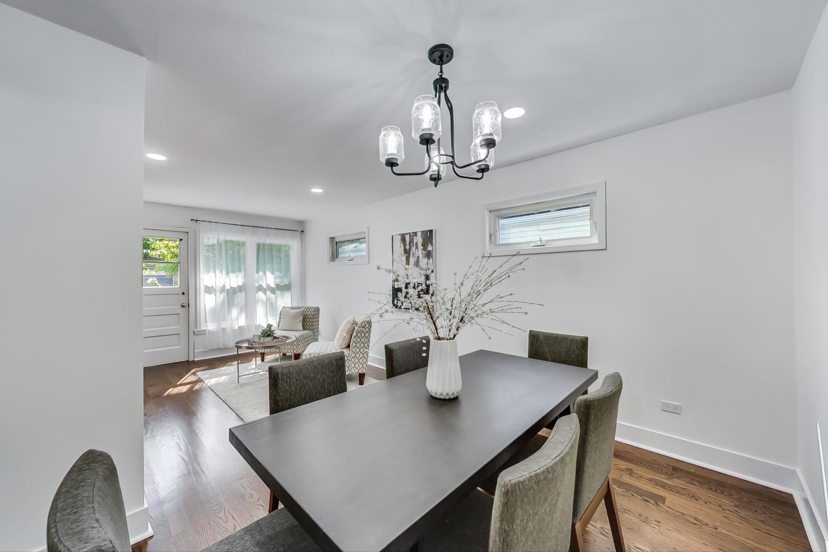 1211 West Talcott Road Park Ridge, IL 60068 - Photo 14 of 57 a view of a dining room with furniture and wooden floor