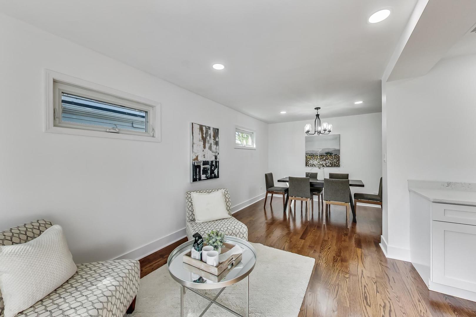 1211 West Talcott Road Park Ridge, IL 60068 - Photo 20 of 57 a living room with furniture and wooden floor
