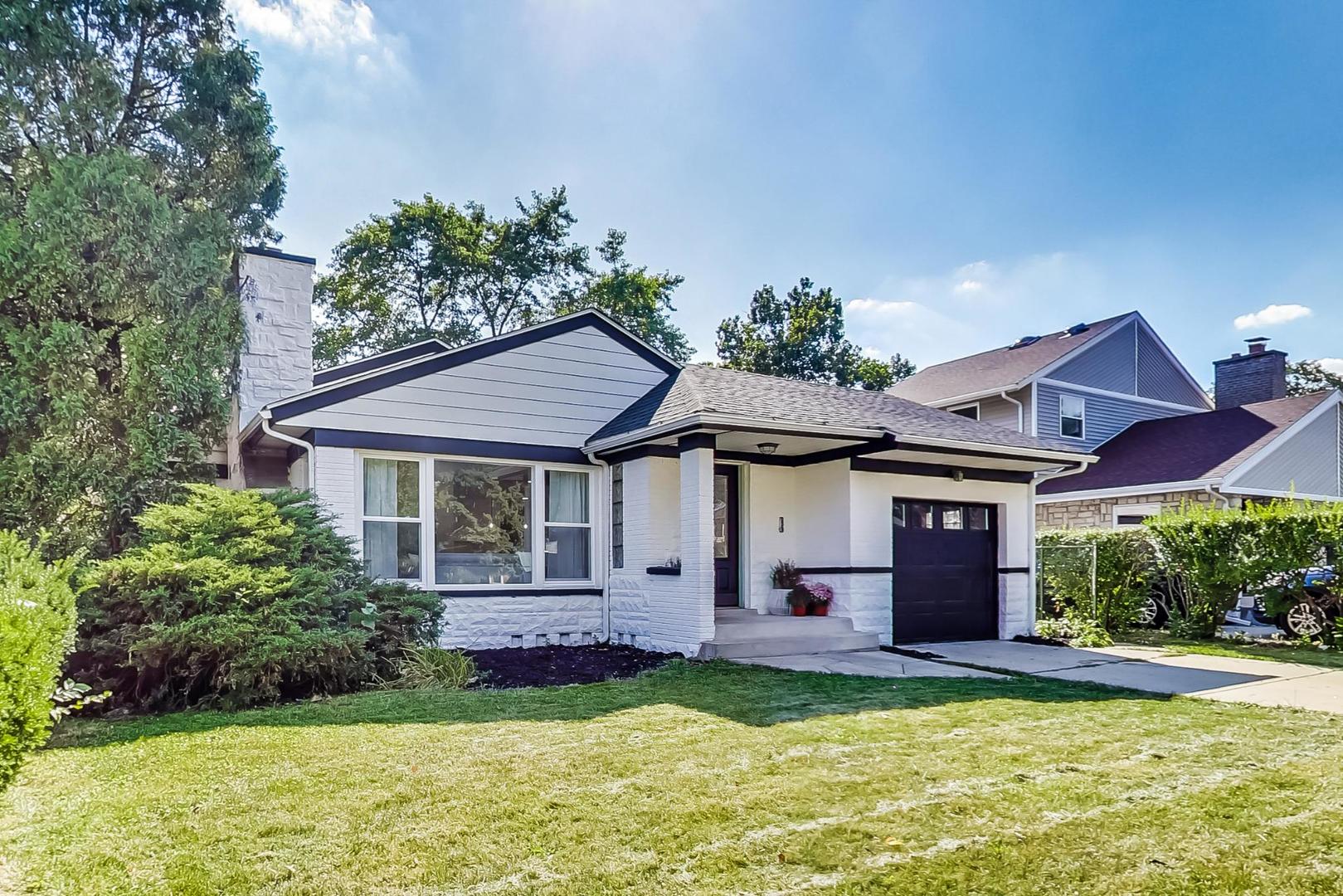 1211 West Talcott Road Park Ridge, IL 60068 - Photo 2 of 57 a view of a house with a garden