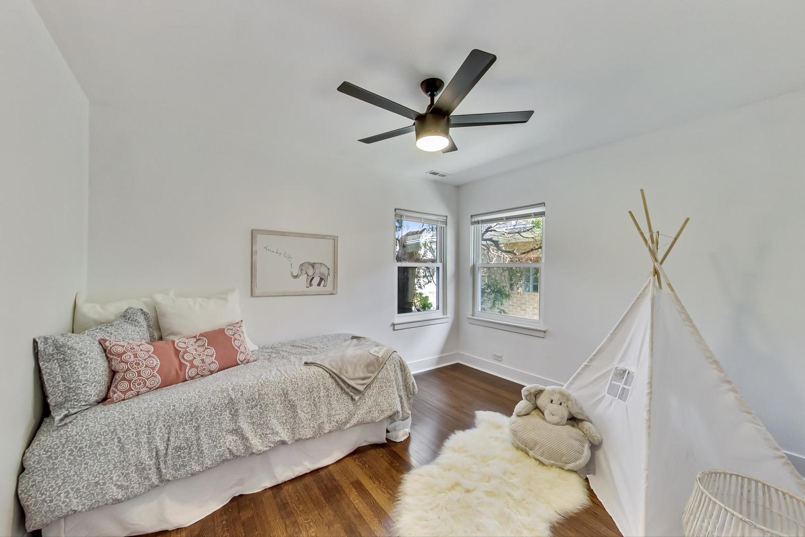 1211 West Talcott Road Park Ridge, IL 60068 - Photo 29 of 57 a living room with a bed furniture and a window