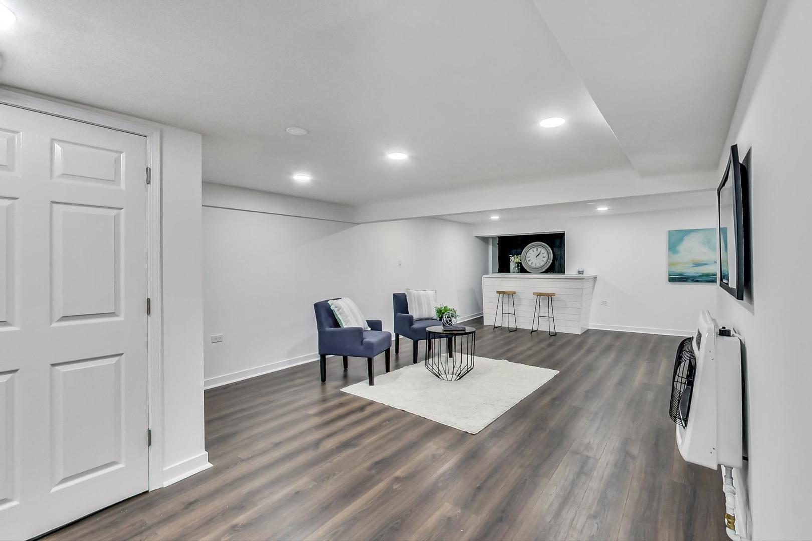 1211 West Talcott Road Park Ridge, IL 60068 - Photo 35 of 57 a view of a dining room with furniture and wooden floor