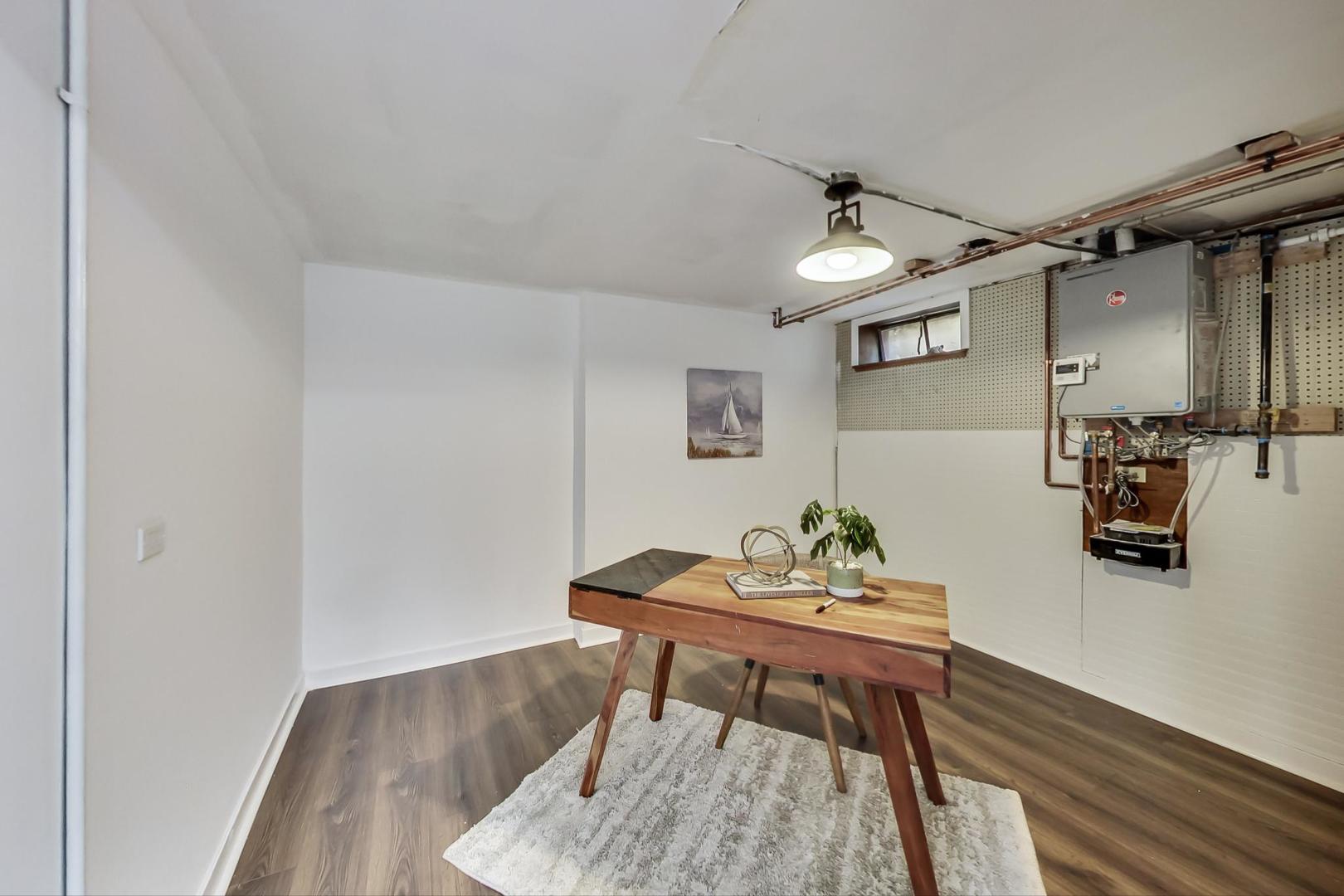 1211 West Talcott Road Park Ridge, IL 60068 - Photo 37 of 57 a dining room with furniture and wooden floor