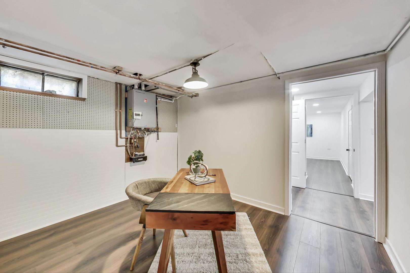 1211 West Talcott Road Park Ridge, IL 60068 - Photo 38 of 57 a view of a room that has a table and chairs in it