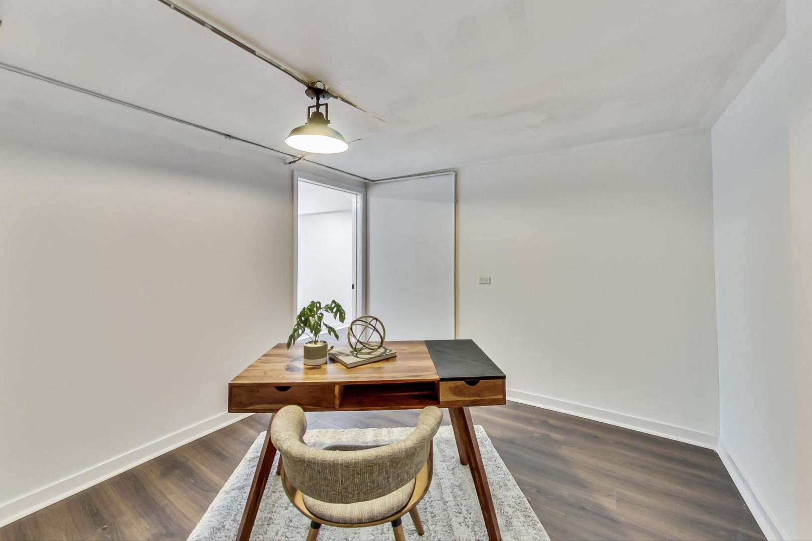 1211 West Talcott Road Park Ridge, IL 60068 - Photo 39 of 57 a view of a dining room with furniture wooden floor and chandelier