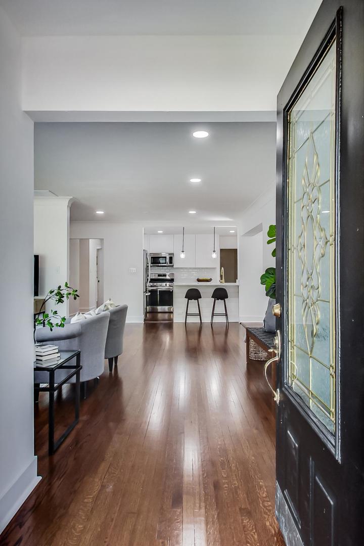 1211 West Talcott Road Park Ridge, IL 60068 - Photo 4 of 57 a living room with furniture and a wooden floor