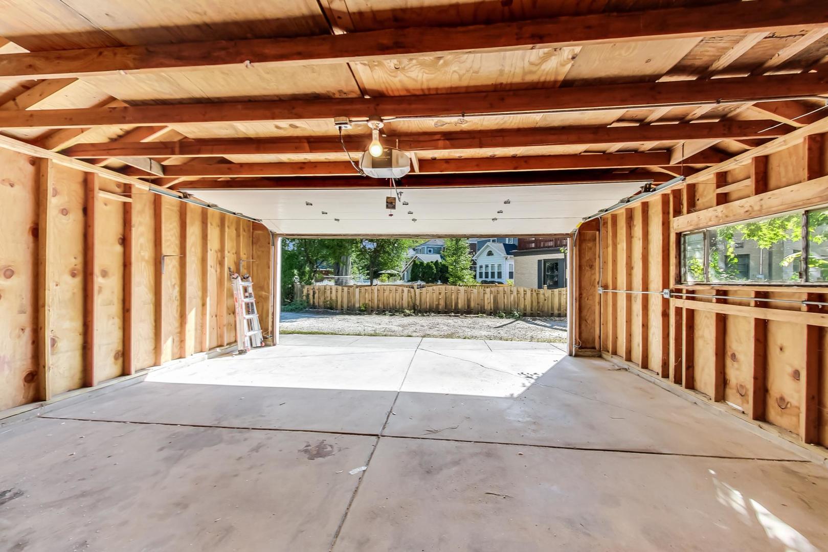 1211 West Talcott Road Park Ridge, IL 60068 - Photo 50 of 57 a view of a garage with wooden floor