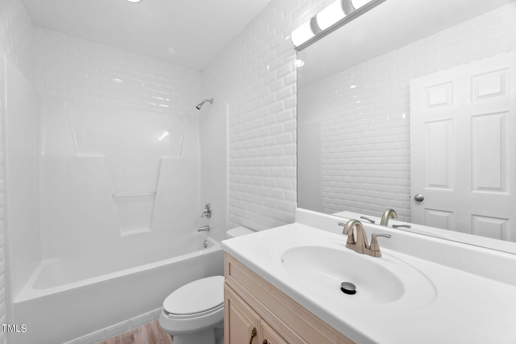 427 Mason Road Durham, NC 27712 - Photo 14 of 29 a bathroom with a sink toilet and shower