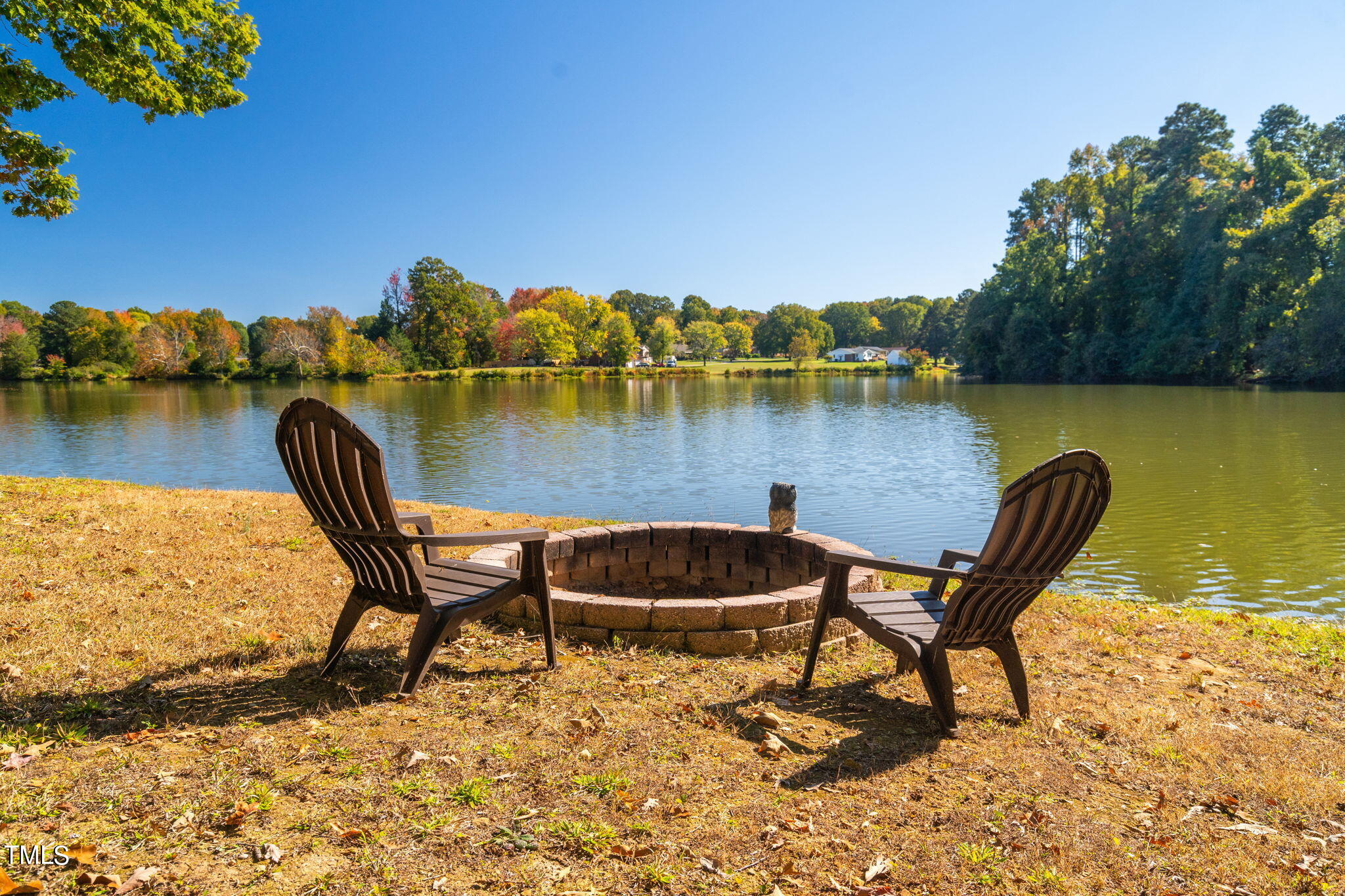 427 Mason Road Durham, NC 27712 - Photo 3 of 29 a view of a lake with table and chairs